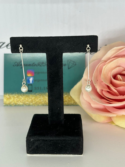 Orecchini pendenti con perla