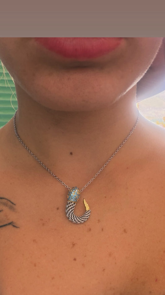 Collana in argento 925 con serpente e topazio azzurro