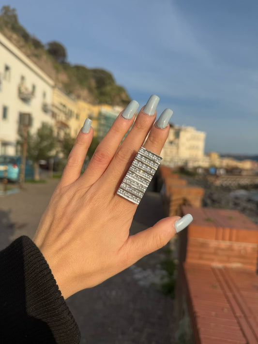 Anello in argento 925 lungo pietre bianche