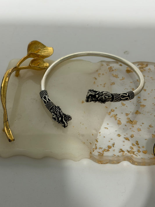 Bracciale etnico in argento 925 con teste di drago