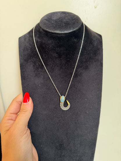 Collana in argento 925 con serpente e topazio azzurro