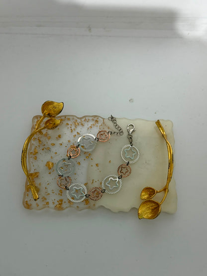 Bracciale stelle in argento rosato e argento 925 — Pezzo Unico Artigianale