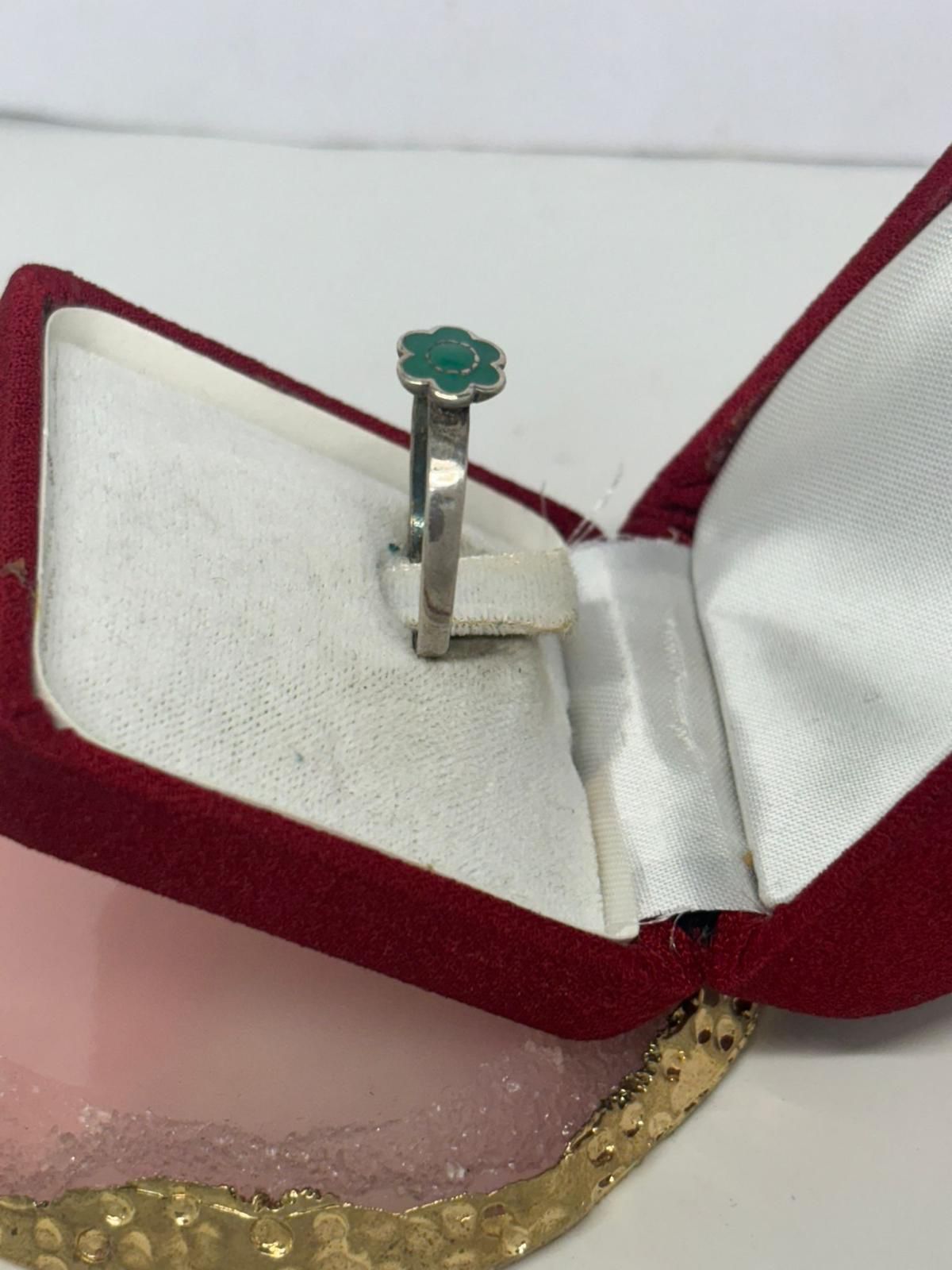Anello fiore smaltato verde in argento 925