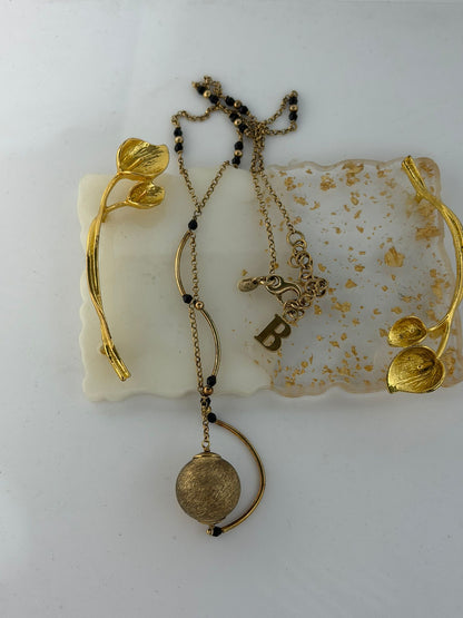 Collana in argento 925 bagnato nell’oro rosa con catena pietre nere e sfera – Firmata