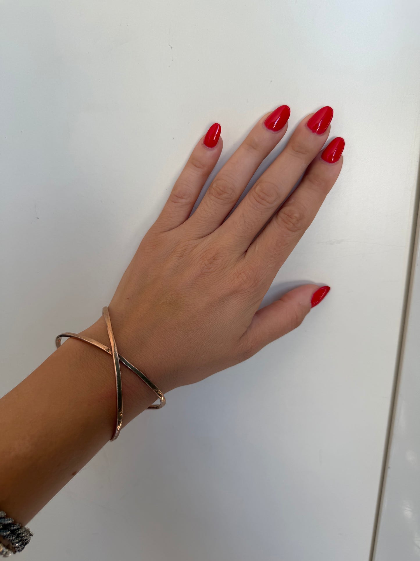Bracciale rigido in argento 925 bagnato oro rosa ad incrocio – regolabile