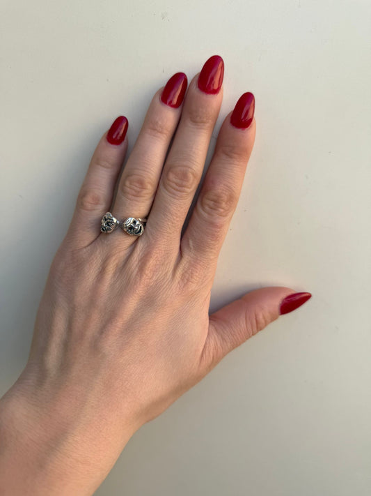 Anello contrarie maschere in argento 925