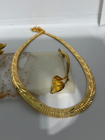 Collana semirigida in argento 925 dorato 18 kt con incisioni