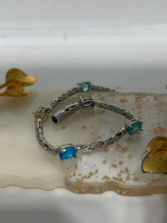 Bracciale in argento 925 con pietre colorate e stelline dorate